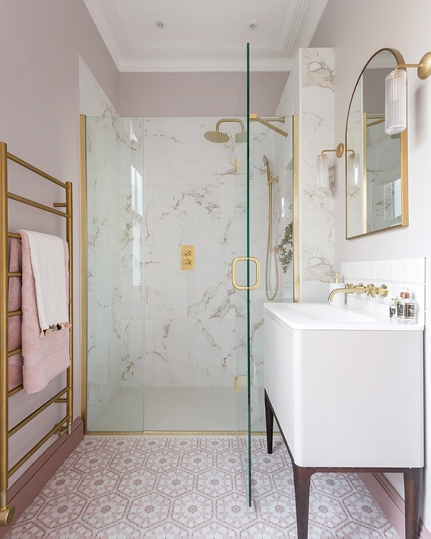 8. Moonlit Mosaic Marvel: a Walk-in Shower with Circular Glass and Starry Night Tiles