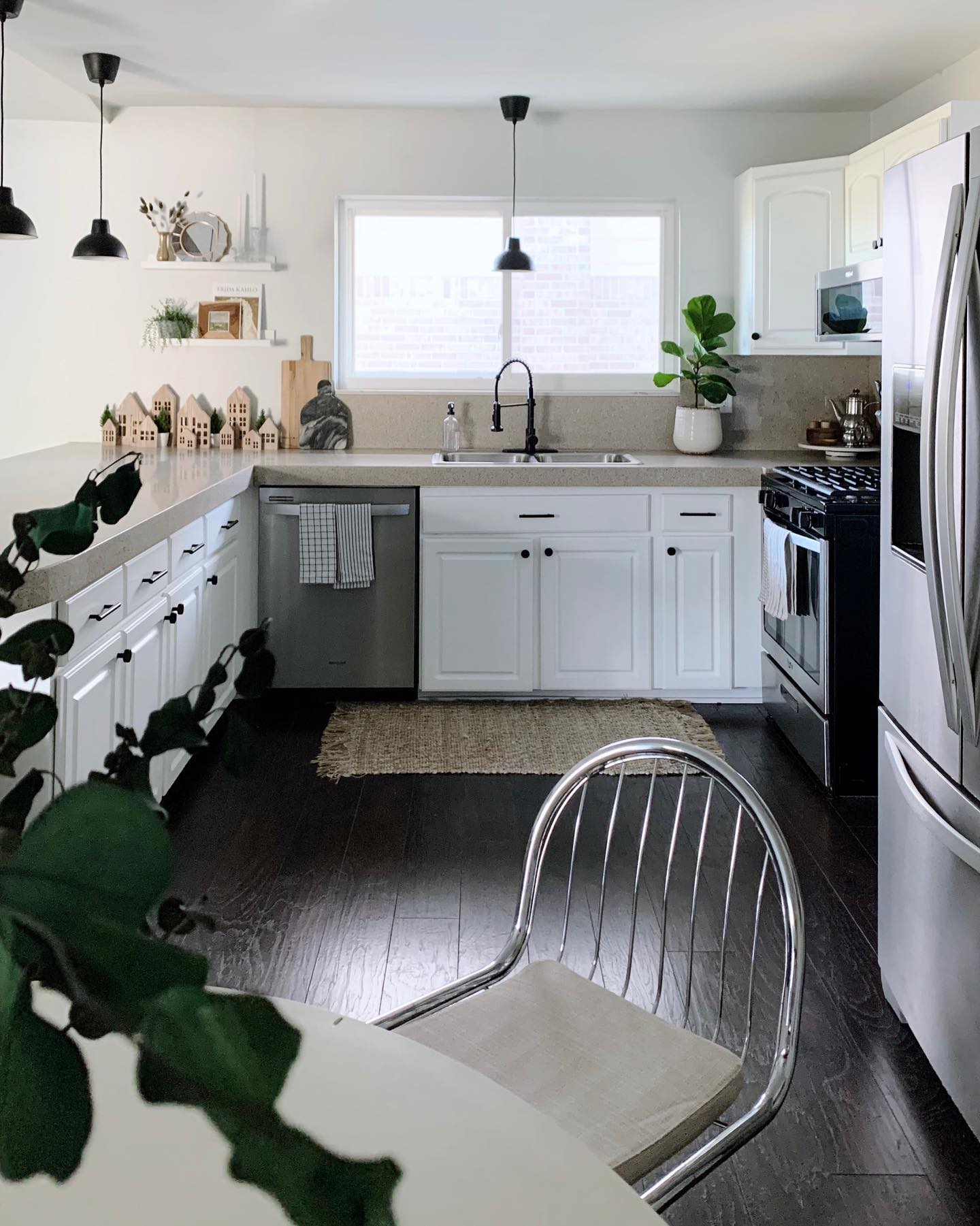 22. Mid Century Mint Green Cabinetry with Geometric Floor Tiles