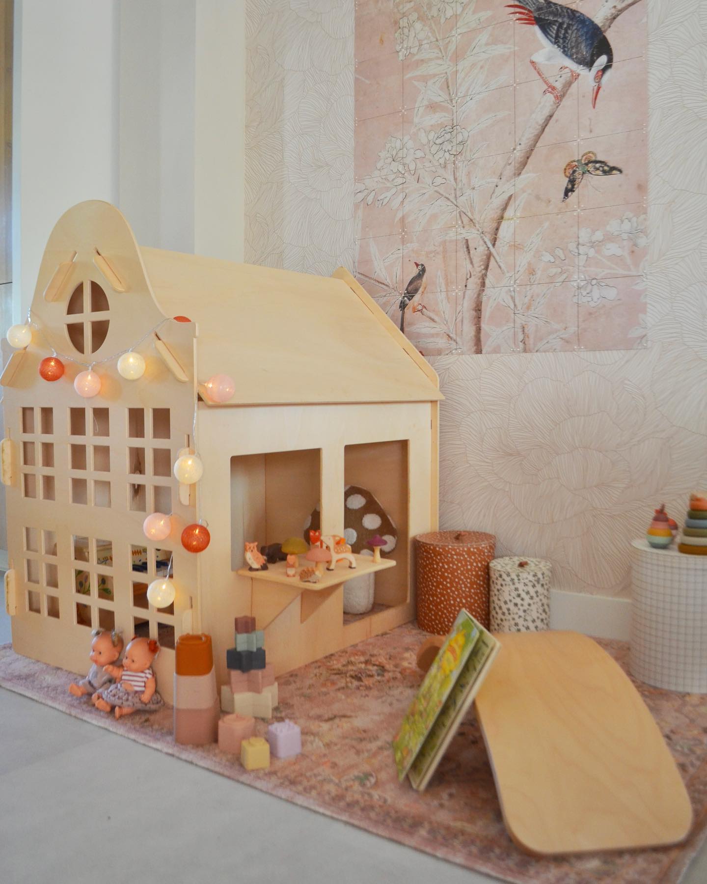 19. Whimsical Treehouse Alcove with Rainbow Slide In Kids' Play Corner