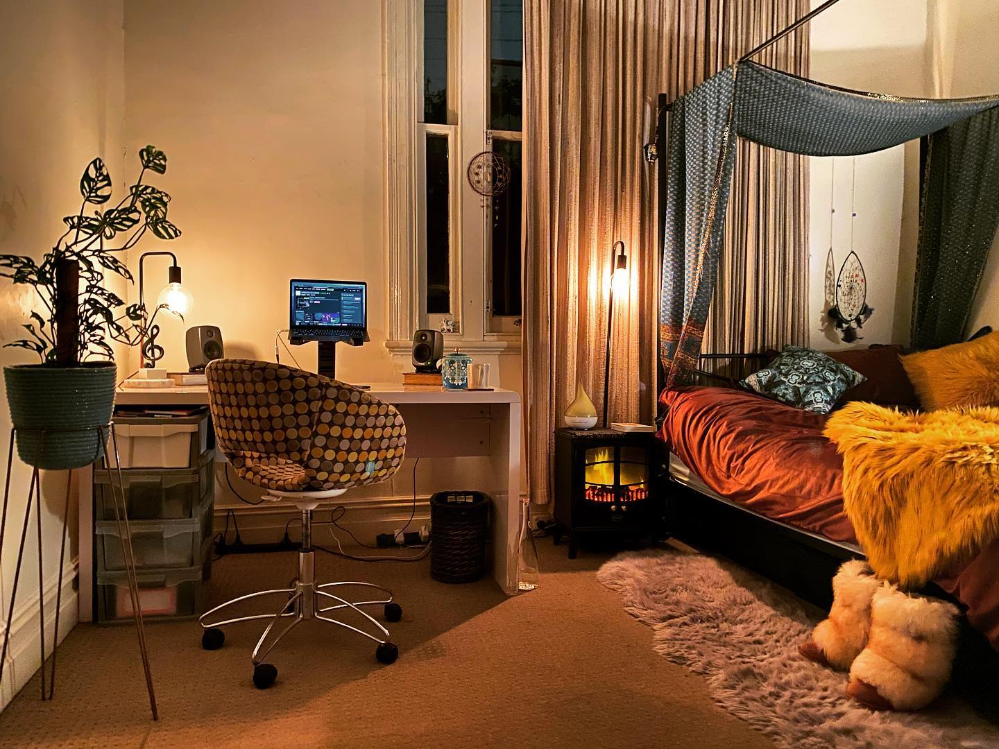 11. Moonlit Workspace with Vintage Charm: a Bedroom Office with a Canopy Bed and Antique Desk