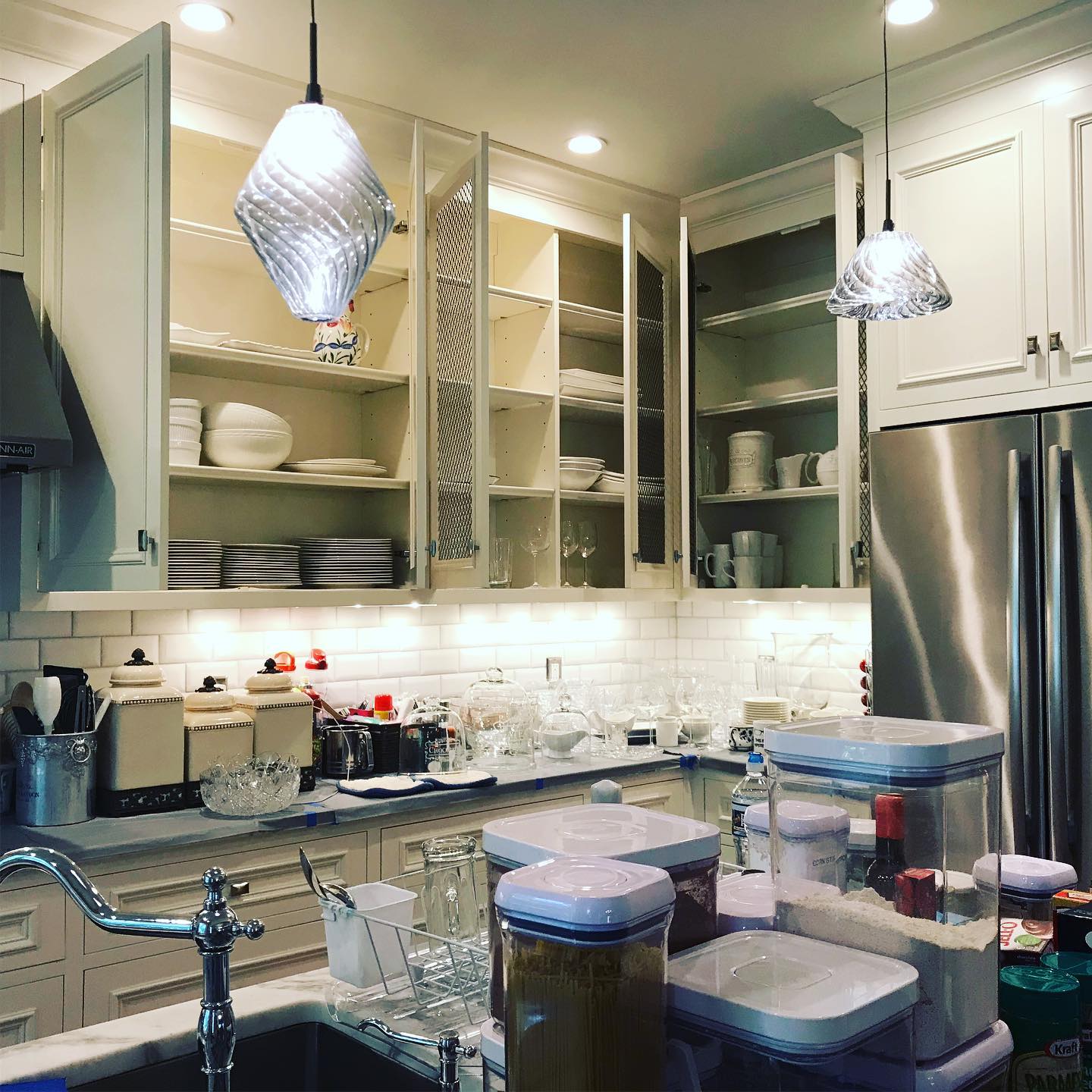 24. Moonlit Spice Rack and Bamboo Ladder Shelving In a Compact Kitchen Nook