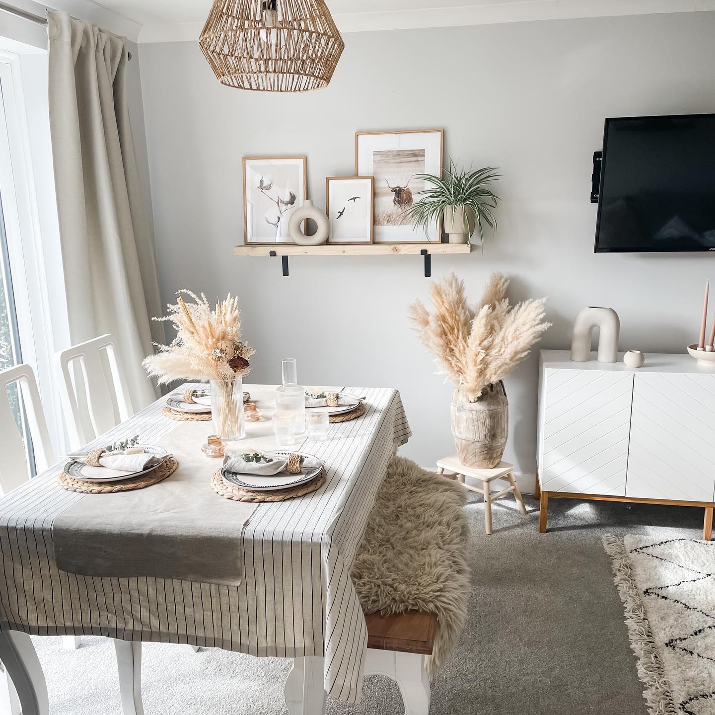 6. Bohemian Tapestry and Lanterns Dining Nook with Geometric Accents