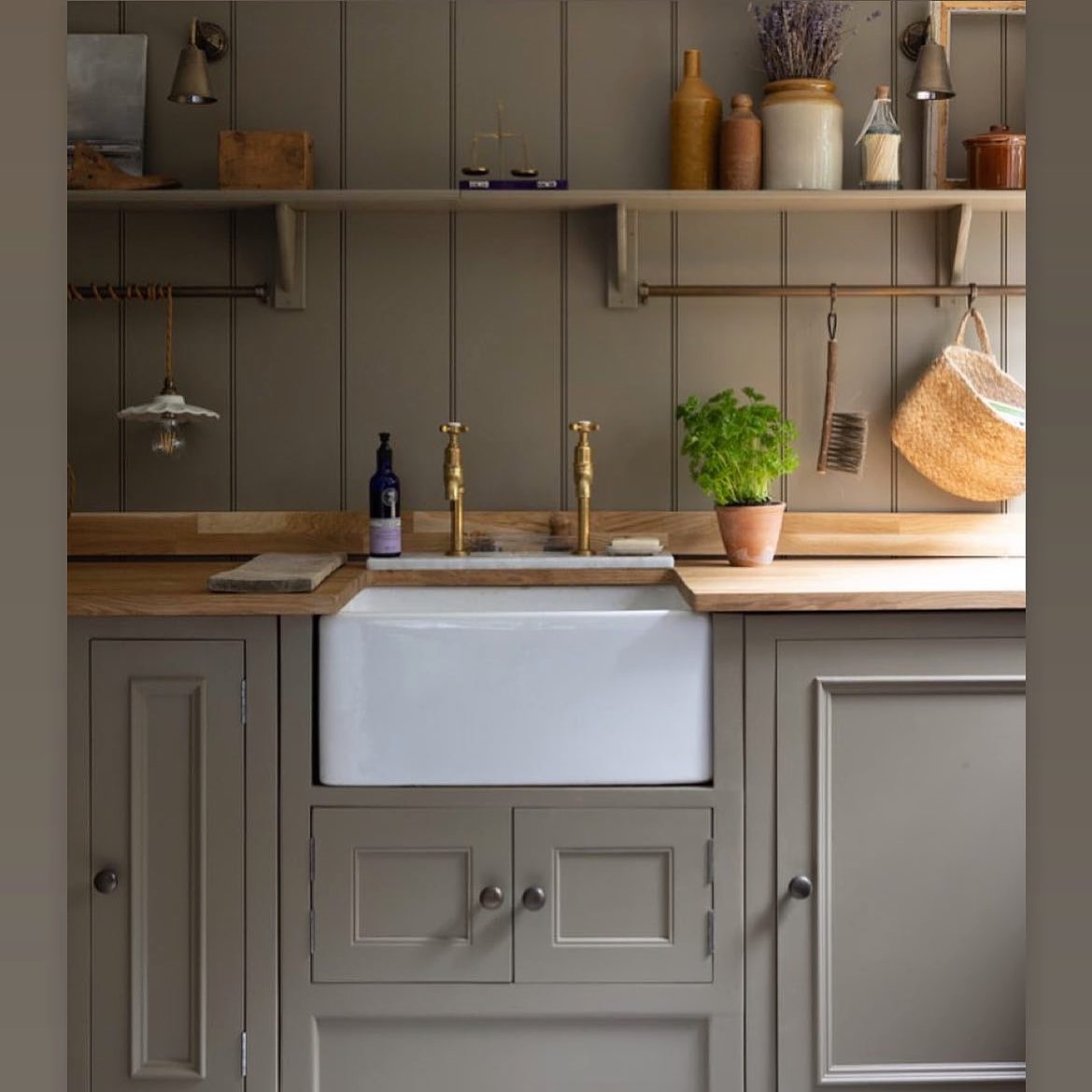 24. a Mosaic Of Teal and Copper Kitchen Tiles Interwoven with Wooden Spoons