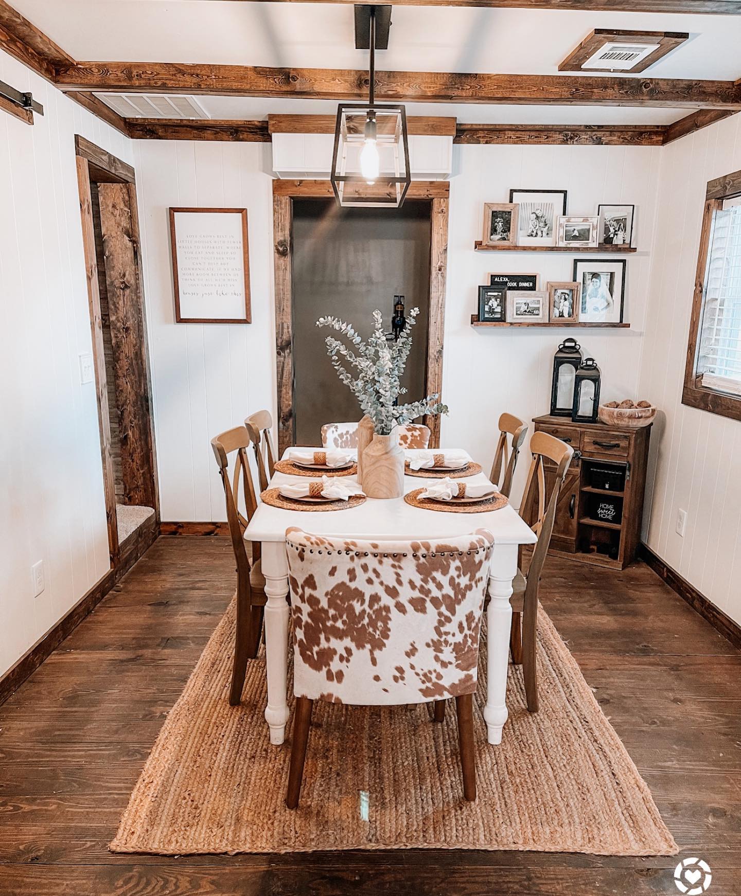 10. Woven Rattan Chandelier Over Vintage Map Tablecloth Boho Dining