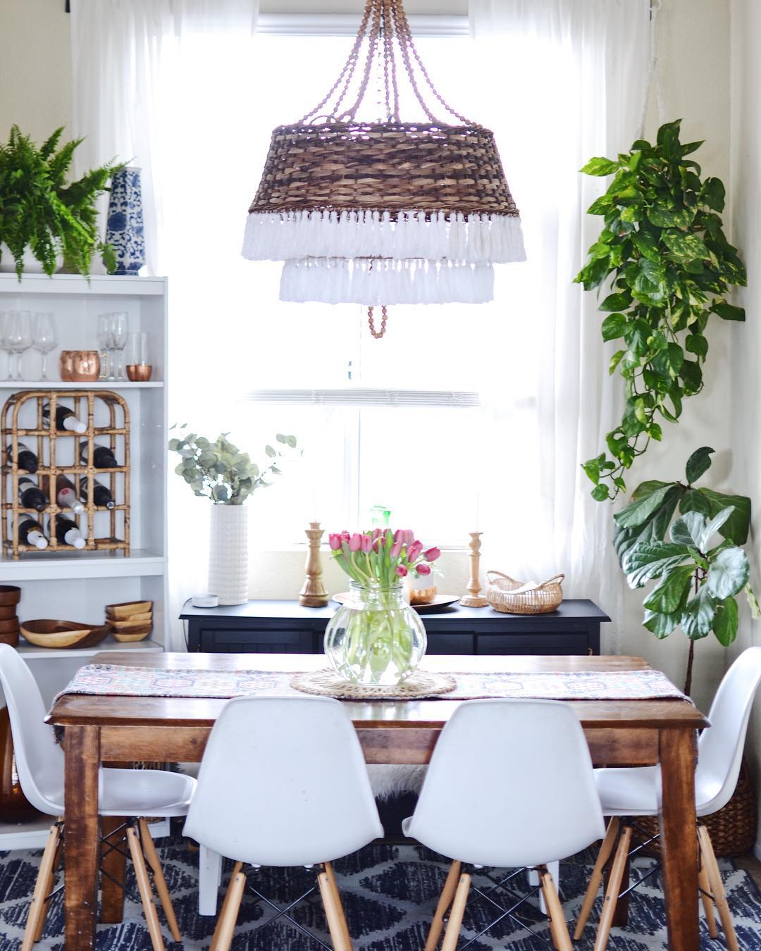 31. Bohemian Tapestry Drapes Over Distressed Wood Dining Table