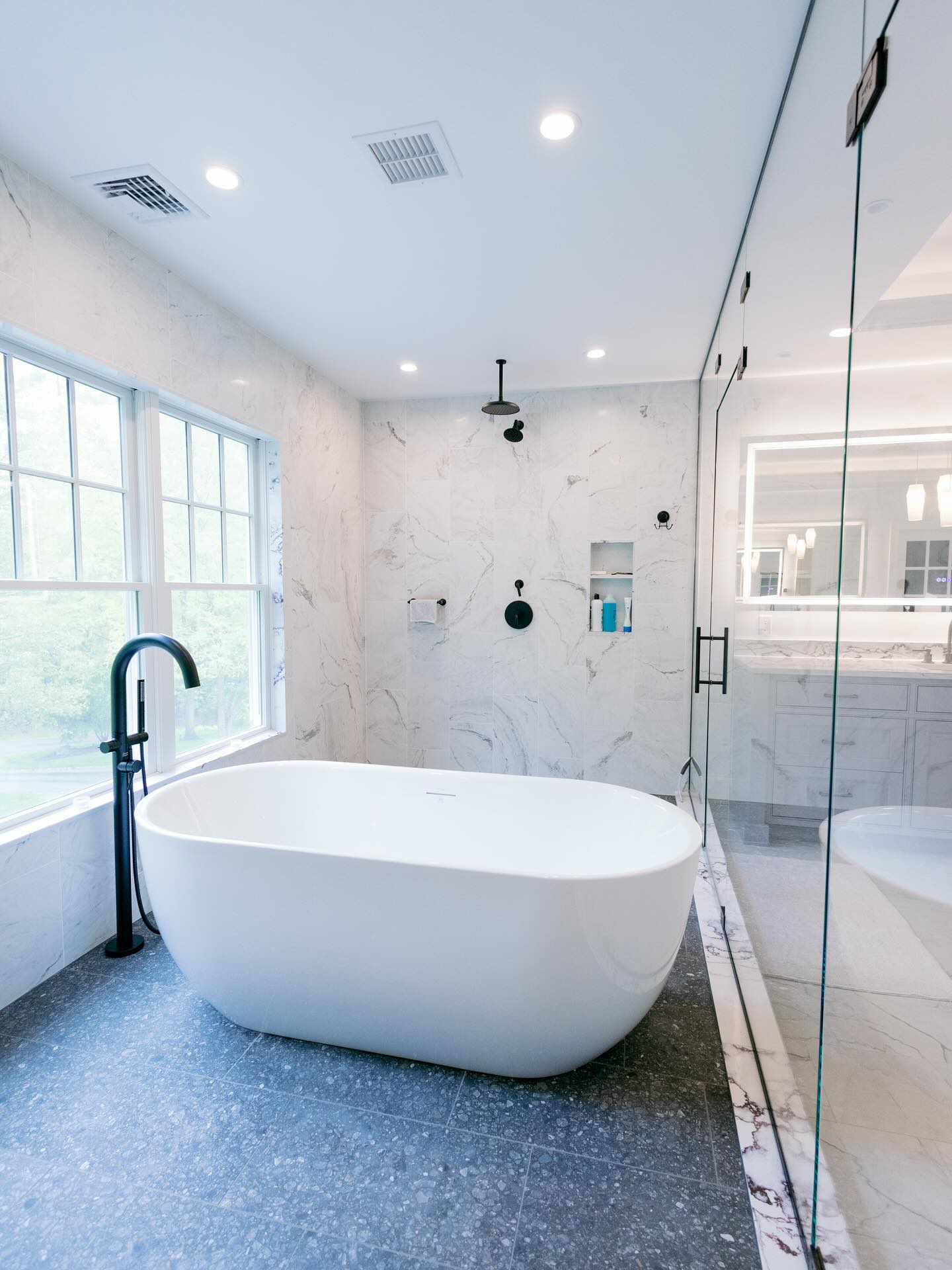16. Moonlit Lagoon Tub with Mosaic Tile Accents