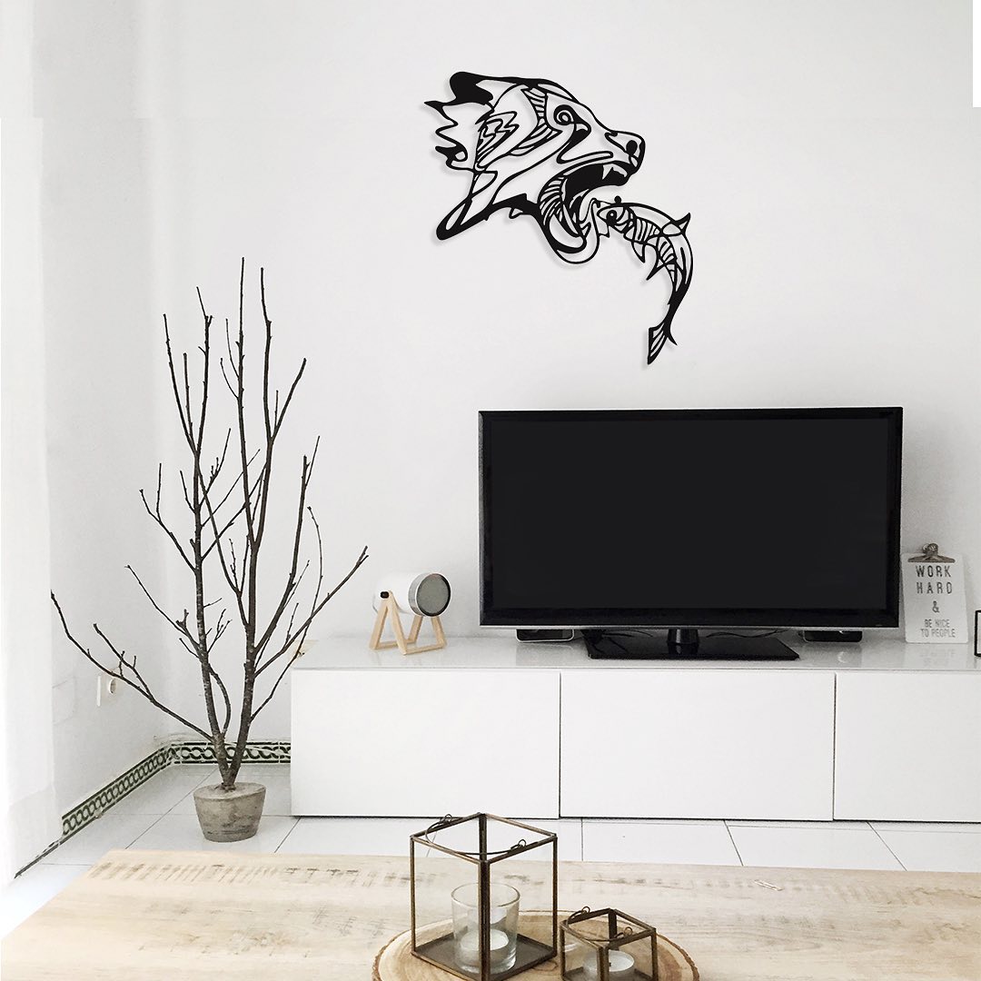 3. Floating Bookshelf Illusion Above the Tv with Geometric Vases