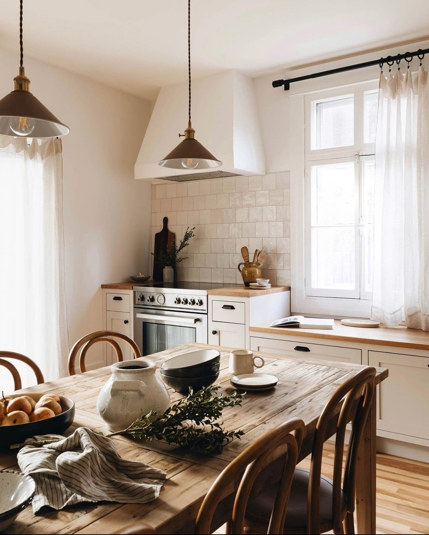 19. Mid-century Maple Cabinets with Atomic Starburst Backsplash and Retro Green Range