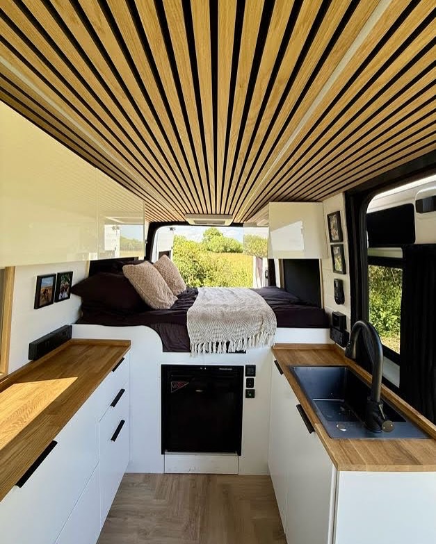 6. Moonlit Escape: the Camper with Starry String Lights and Cozy Knitted Throws