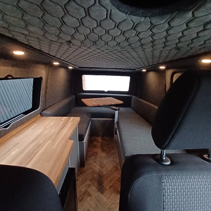 19. Tiny Camper with a Forest Green Velvet Sofa and Brass Accents