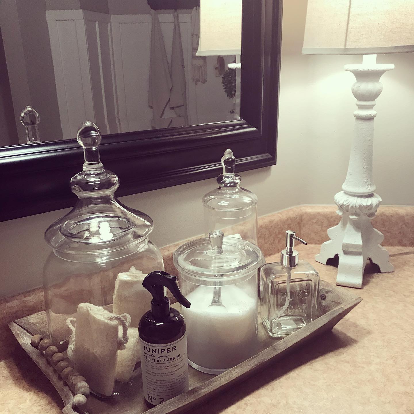 6. Moonlit Marble and Monstera: a Serene Bathroom Counterscape