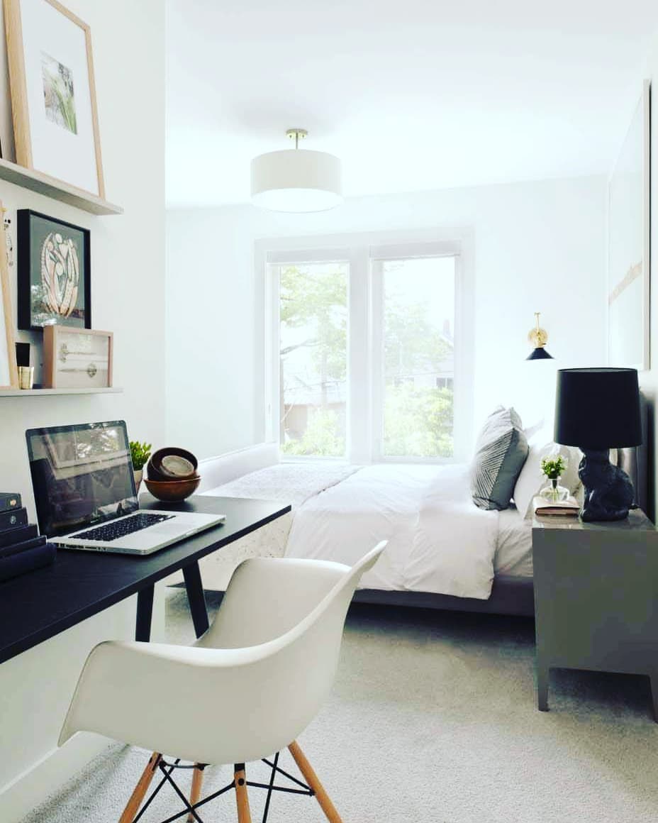 12. a Floating Desk Amidst a Forest Of Bookshelves and a Ladder