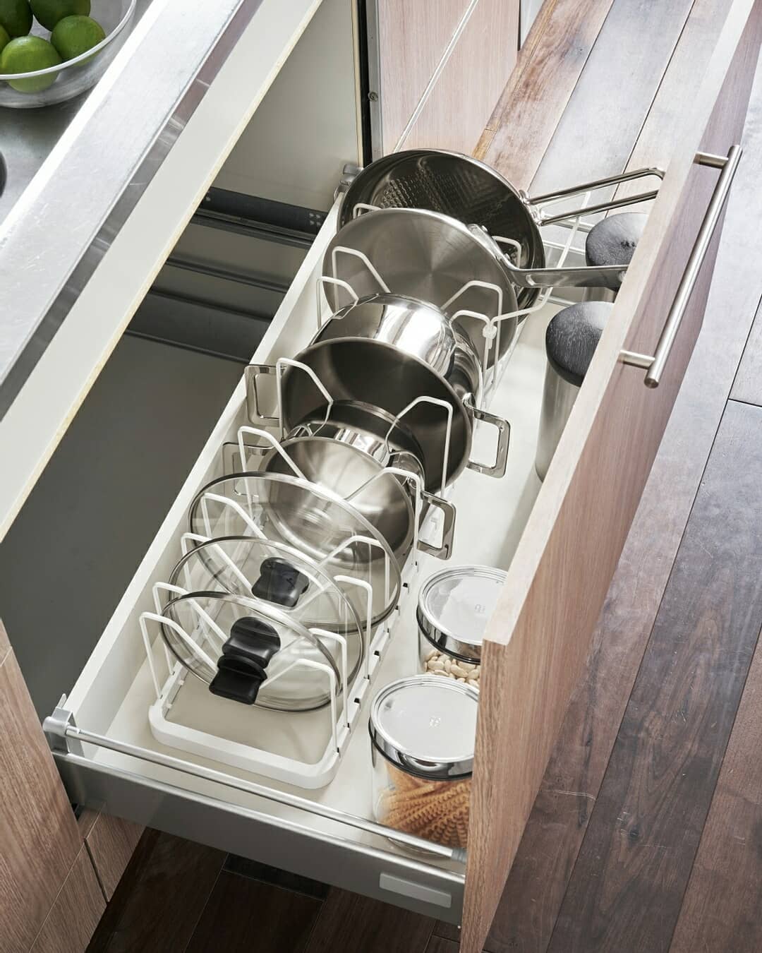 21. Sleek Pull-out Spice Racks with Geometric Patterned Backsplash