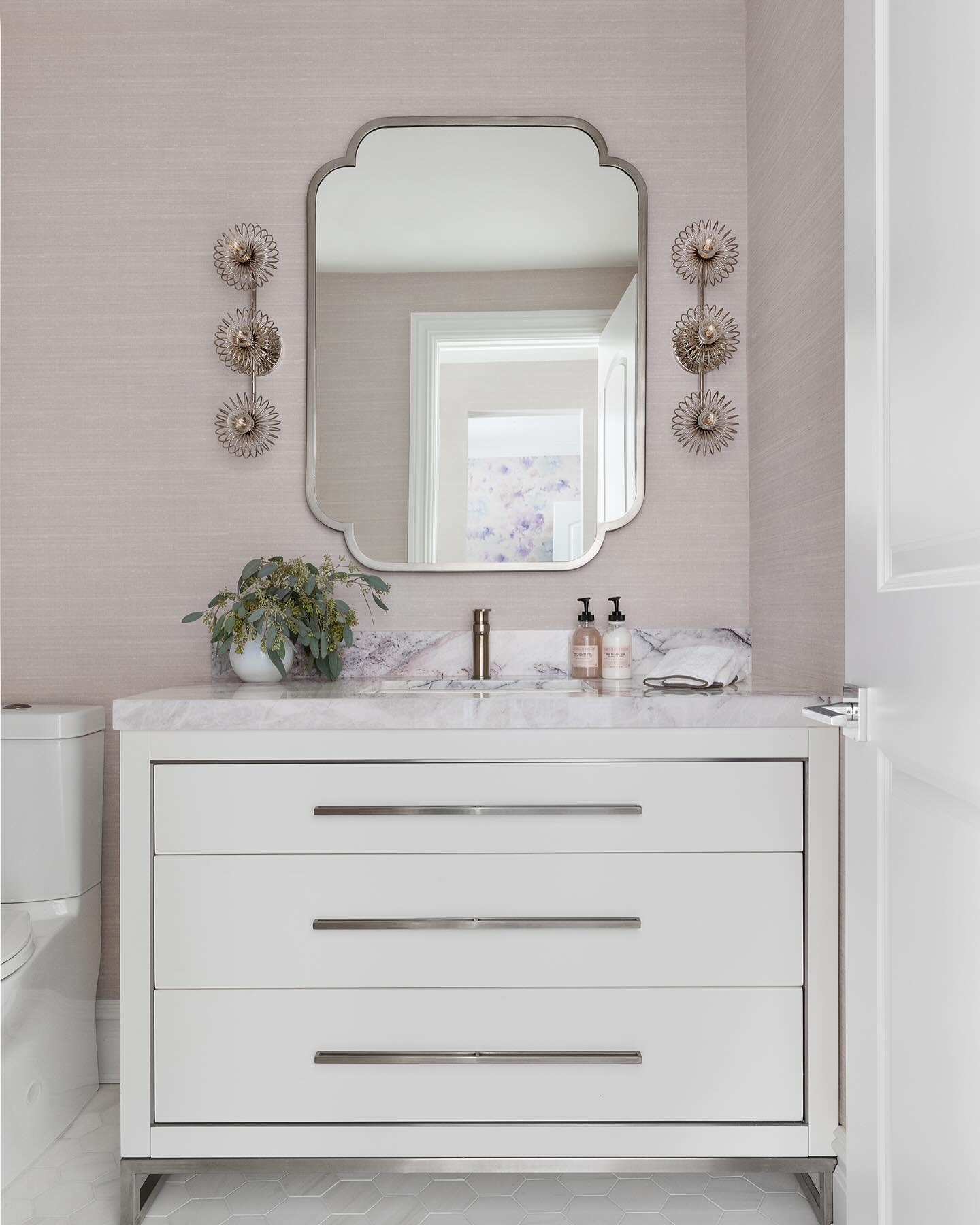16. Soft Blush Tiles Meet Vintage Brass: a Whimsical Bathroom Escape
