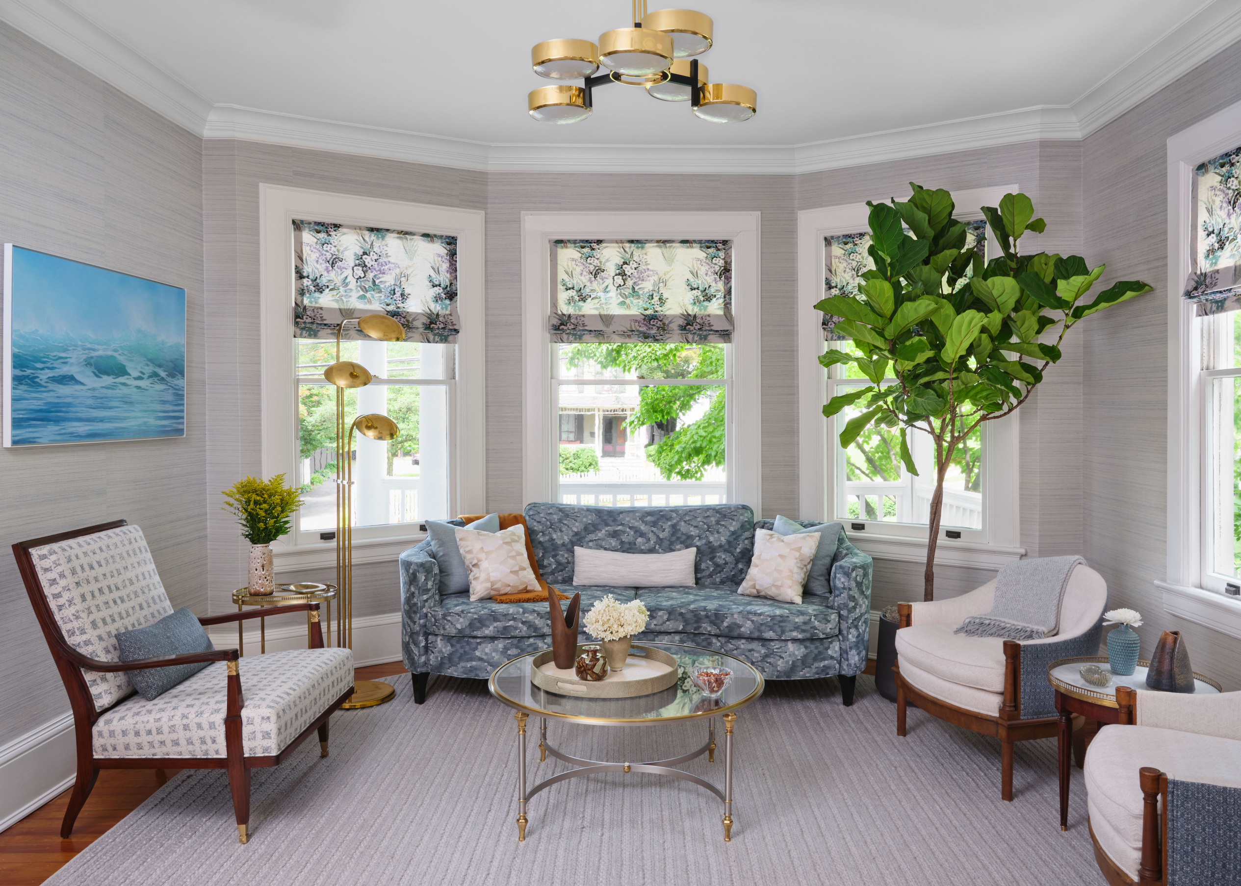 16. Velvet Emerald Sofa and Gold Accents Define a 1920s Parisian Salon