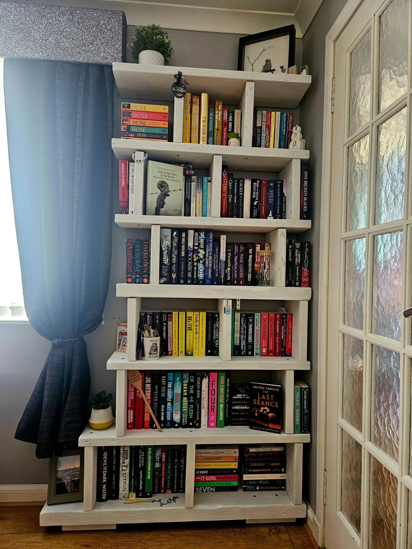 13. the Teal Ladder and Woven Basket Bookshelf Ensemble