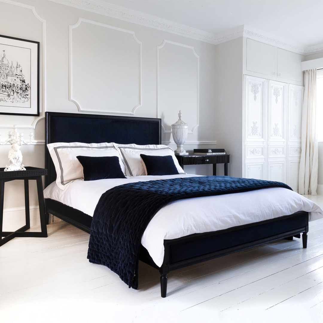 13. Moonlit Shadows on Crisp White Linens: a Bedroom with Geometric Intrigue
