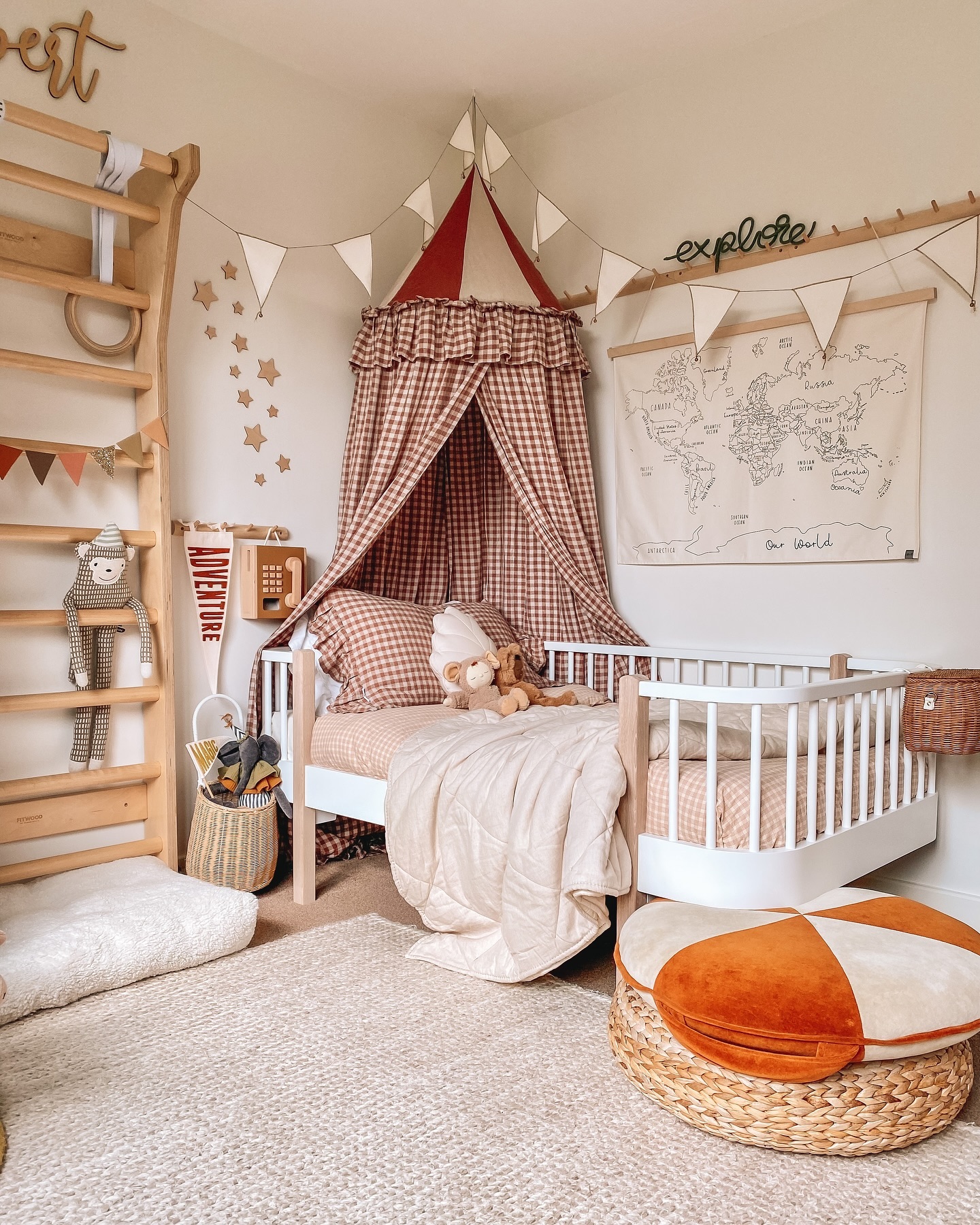 26. Whimsical Canopy Bed with Starry Night Wall Accent and Cozy Nook