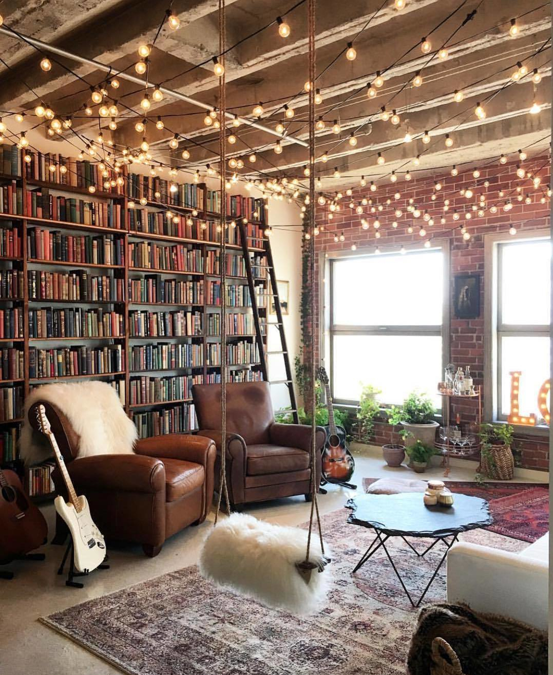 20. Suspended Wooden Ladder Shelves with Eclectic Book Arrangement