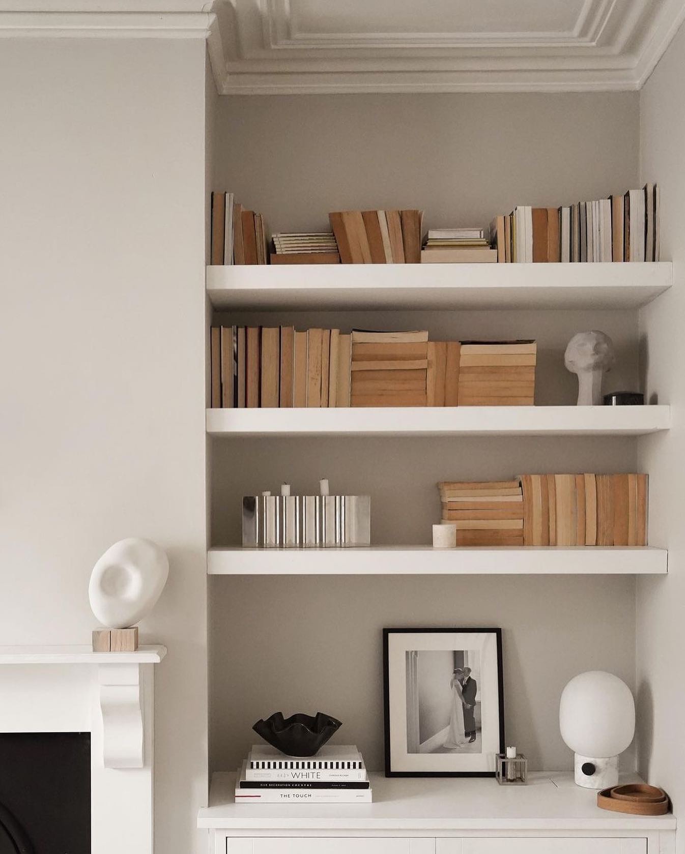 21. a Symphony Of Geometric Volumes and Vintage Leather In Book Arrangement