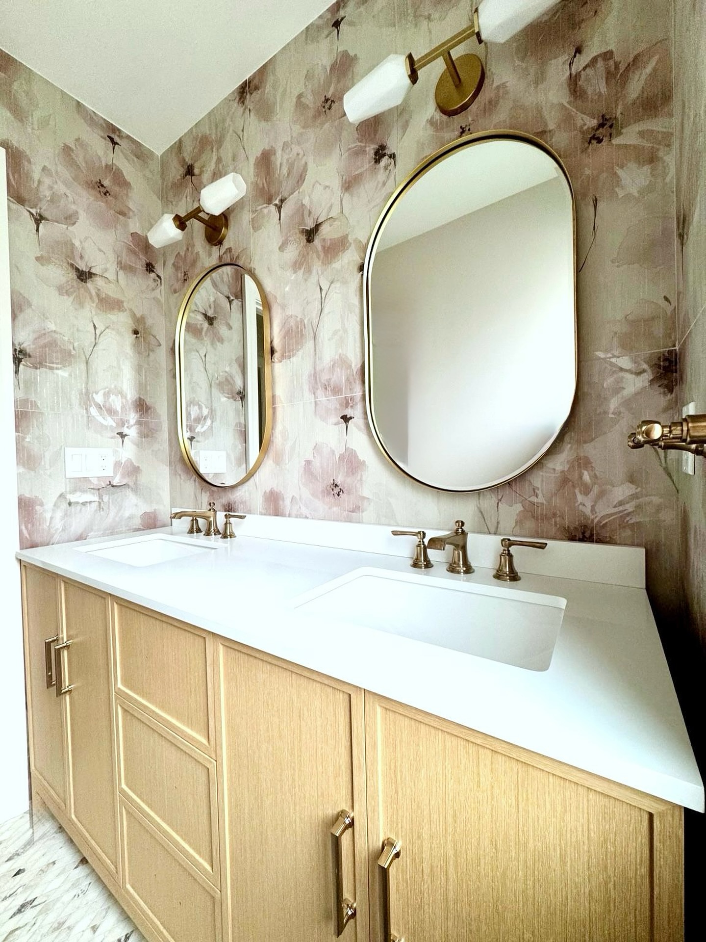 28. Vibrant Mosaic Tiles and Floating Vanity In a Youthful Haven