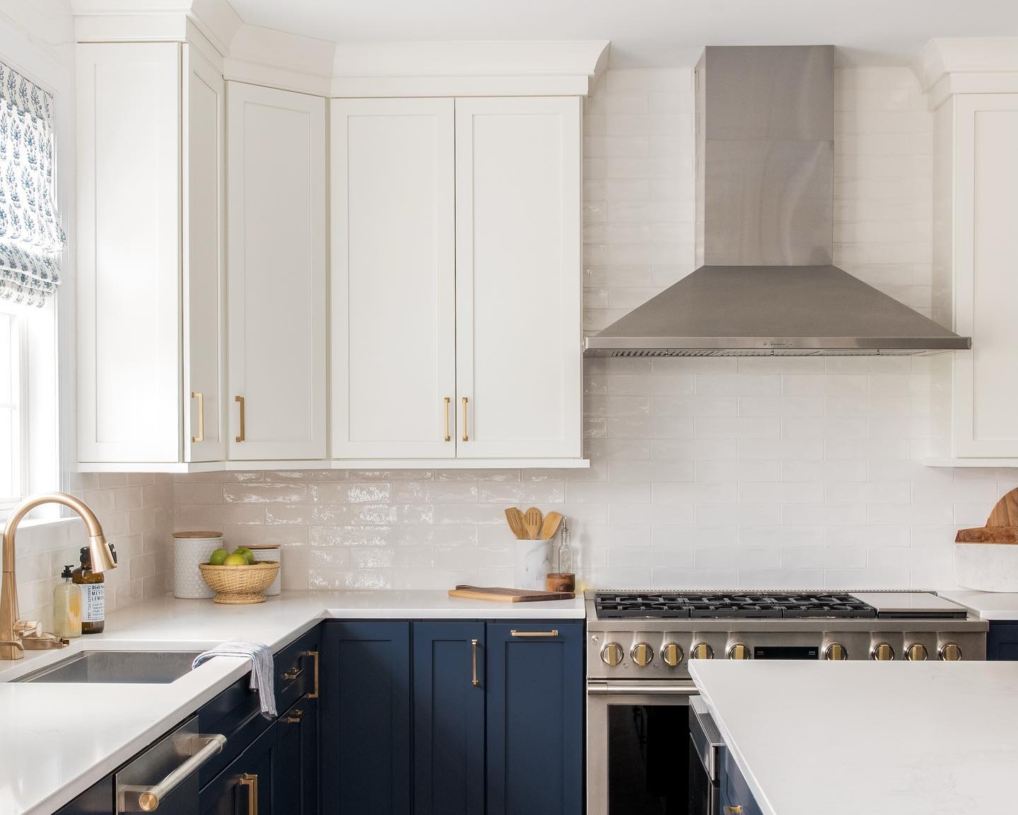 10. the Porcelain Rabbit and Amber Bottles Perched Above the White Cabinets