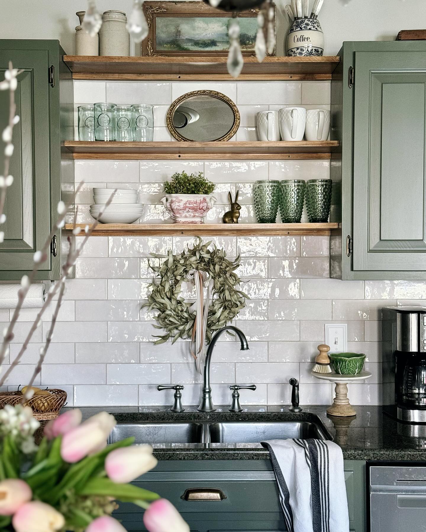 14. Sunlit Serenity: a Delicate Dance Of Dried Lavender and Vintage Glass Above the Cabinets