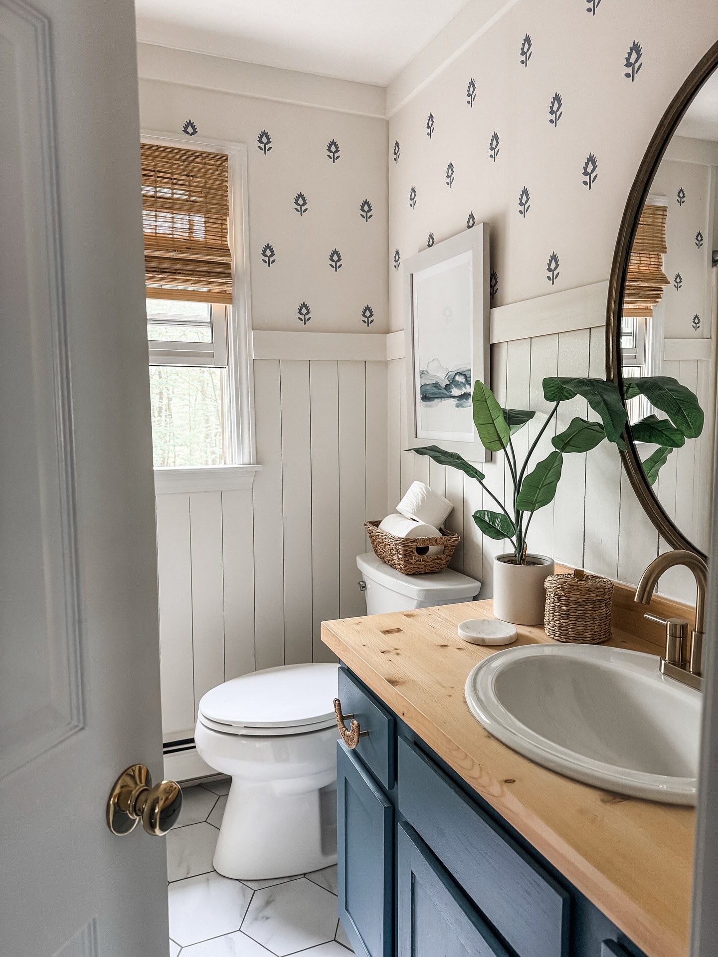 4. Coastal Serenity: Seafoam Green Tiles and Driftwood Mirror In a Nautical Haven