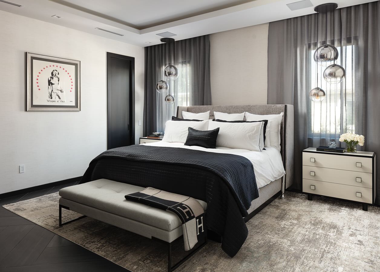 25. Moonlit Serenity: Black and White Bedroom with Geometric Wall Art and Suspended Bed