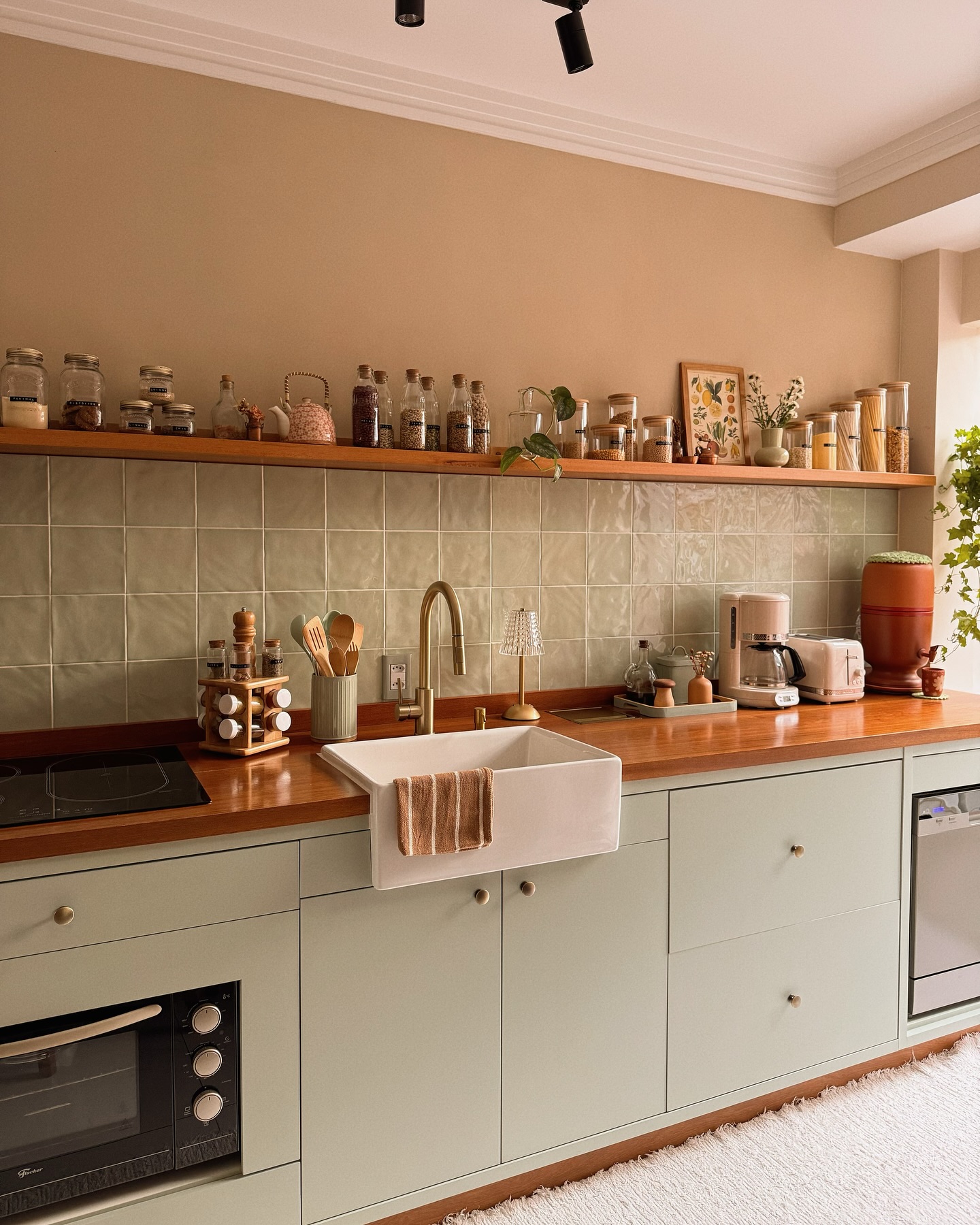 7. a Weathered Barnwood Hutch with Mason Jar Votive Holders and Antique Copper Utensils