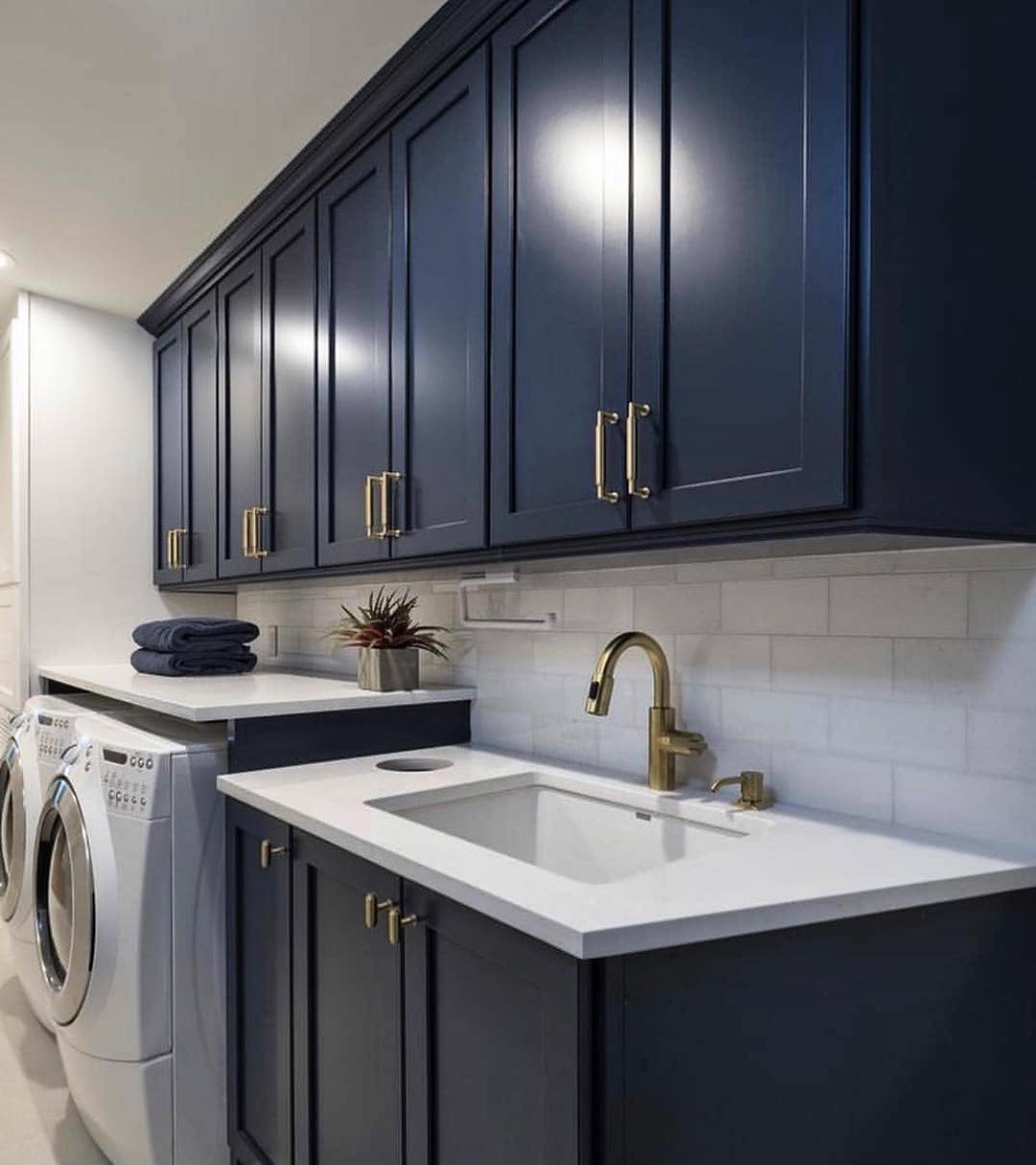 16. the Interlocking Lattice Doors and Industrial Chic Of a Compact Laundry Room