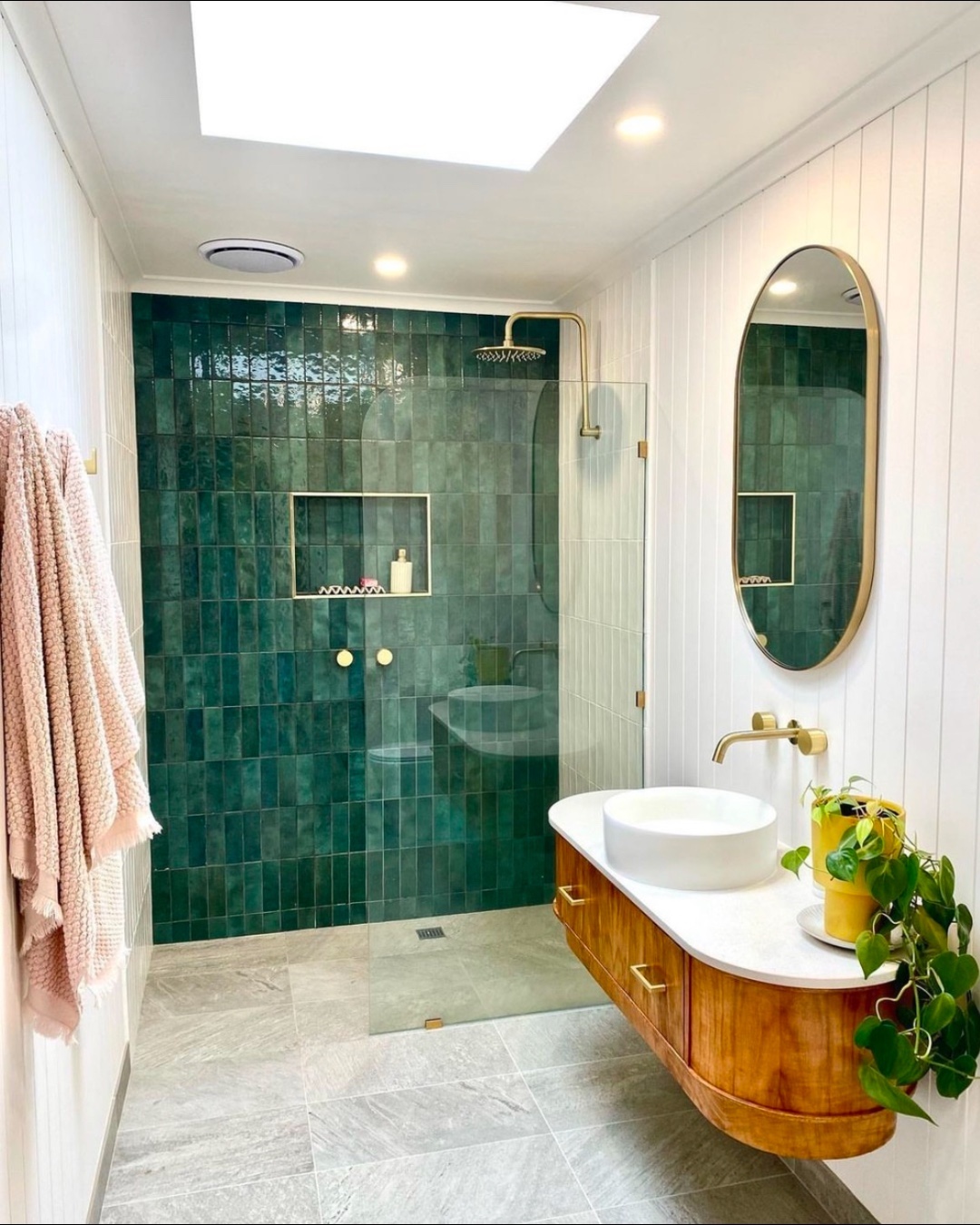 14. Coastal Retreat with Geometric Tiles and Natural Wood Accents