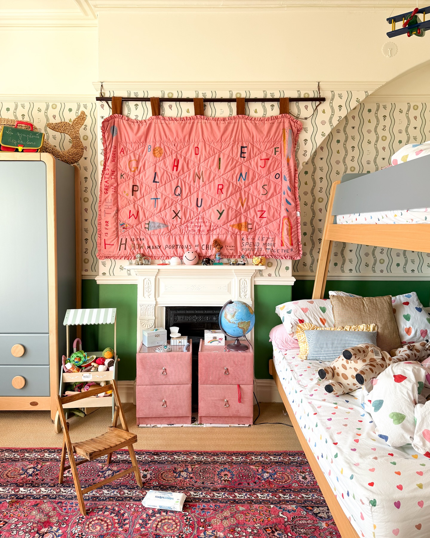 33. a Whimsical Forest Canopy Bed with Mushroom Nightstand and Glowing Fairy Lights