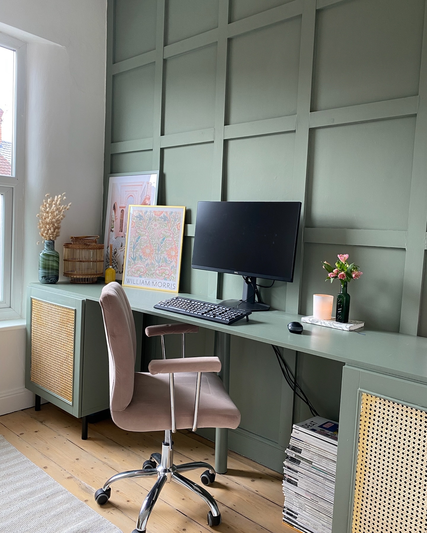 21. Cobalt Blue Accent Wall with Floating Shelves and Geometric Rug