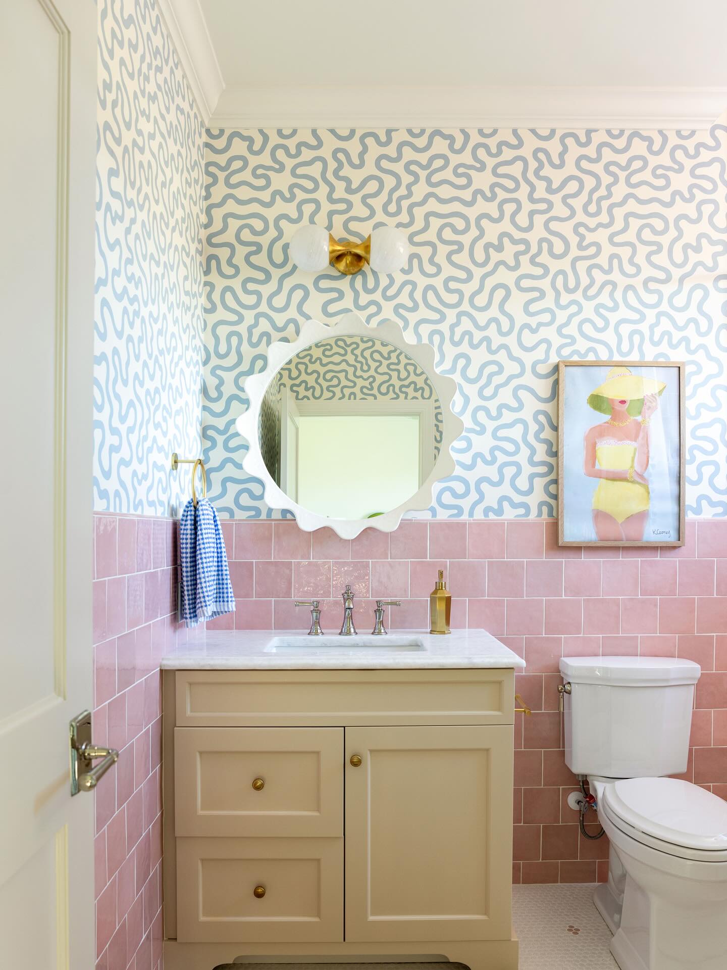 4. Moonlit Serenity: Silver Accents and Frosted Glass In a Petite Powder Room