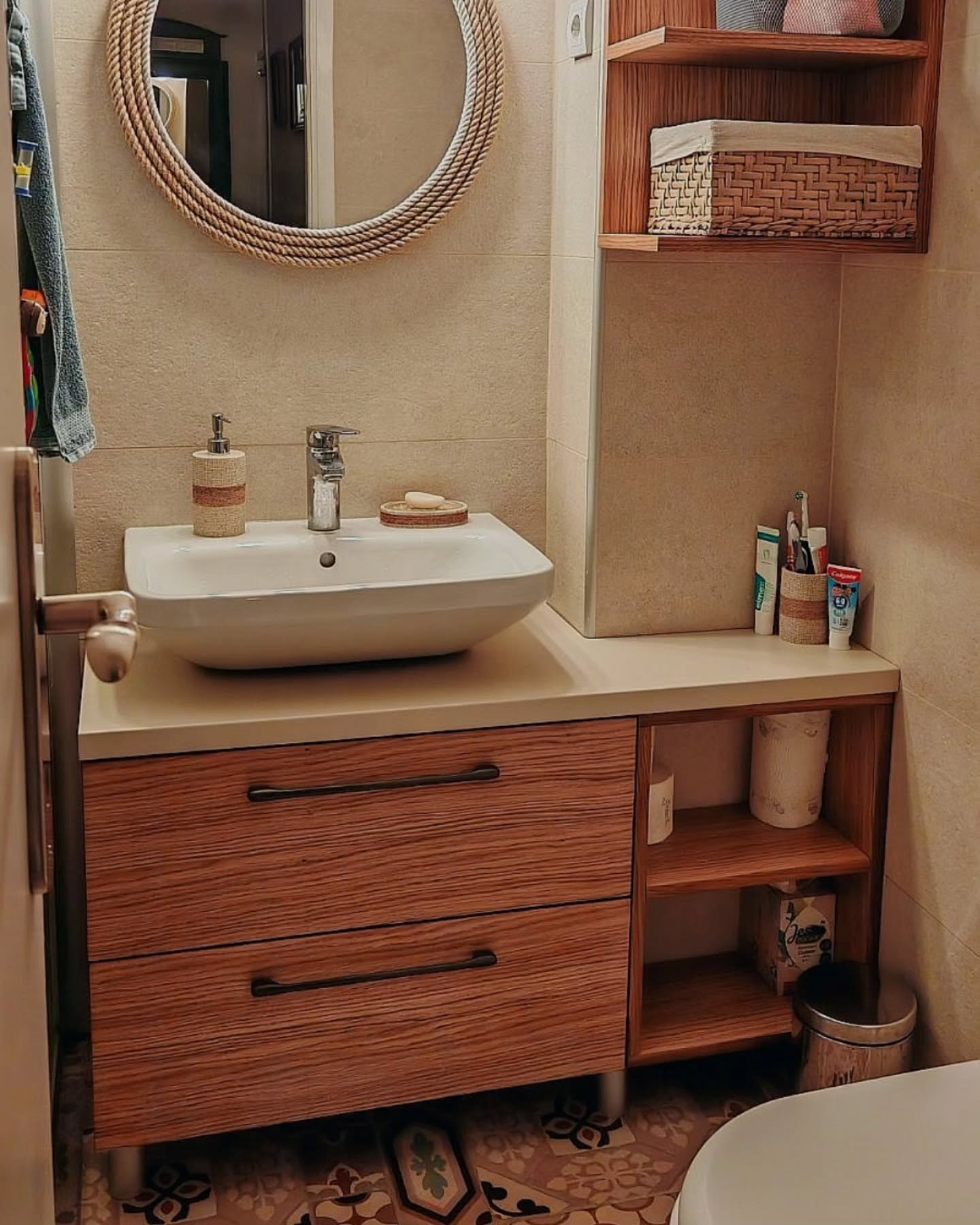 14. Frosted Glass Panels and Geometric Brass Handles on a Streamlined Cabinet