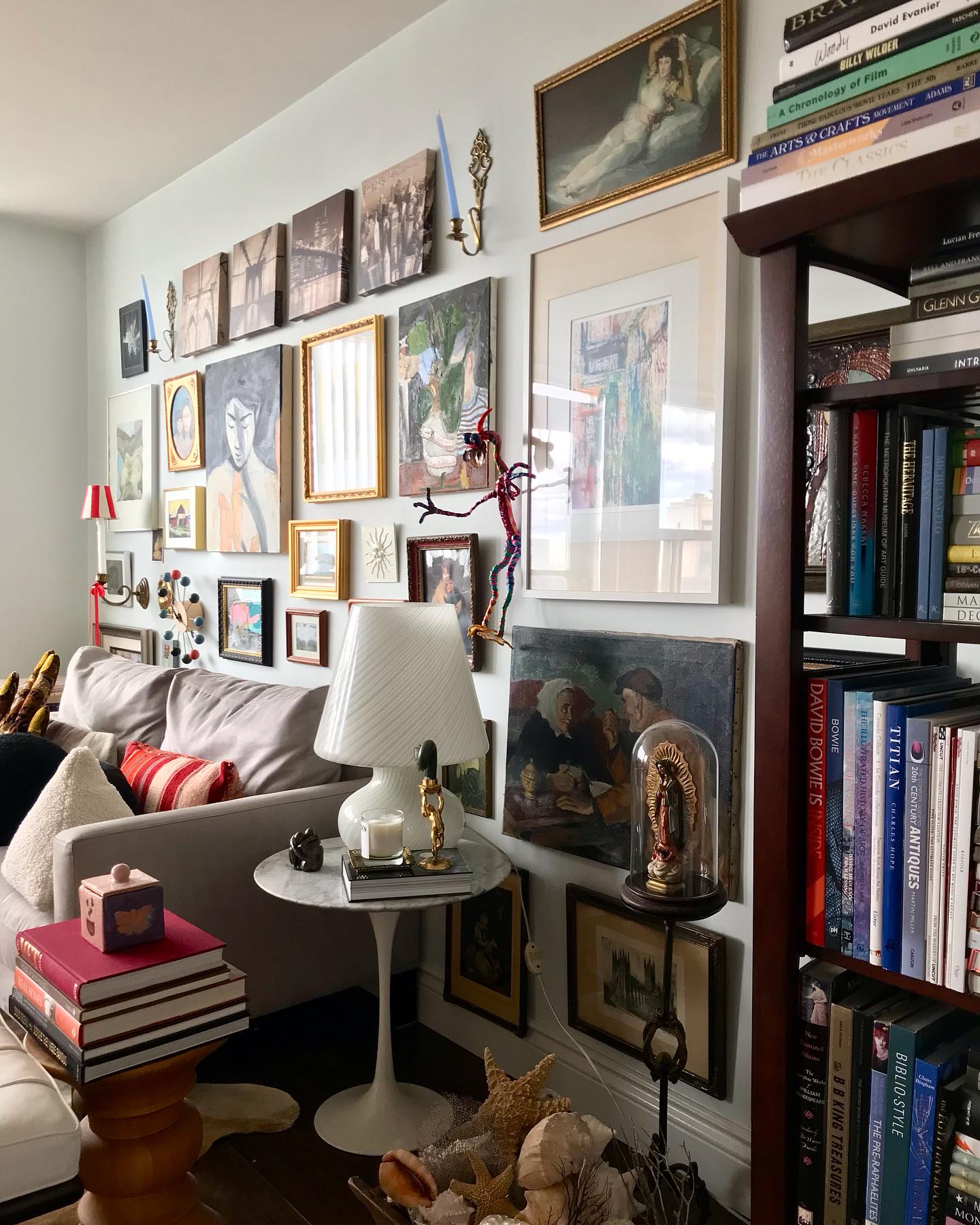 9. Layered Timber and Glass Fusion Shelving with Verdant Accents