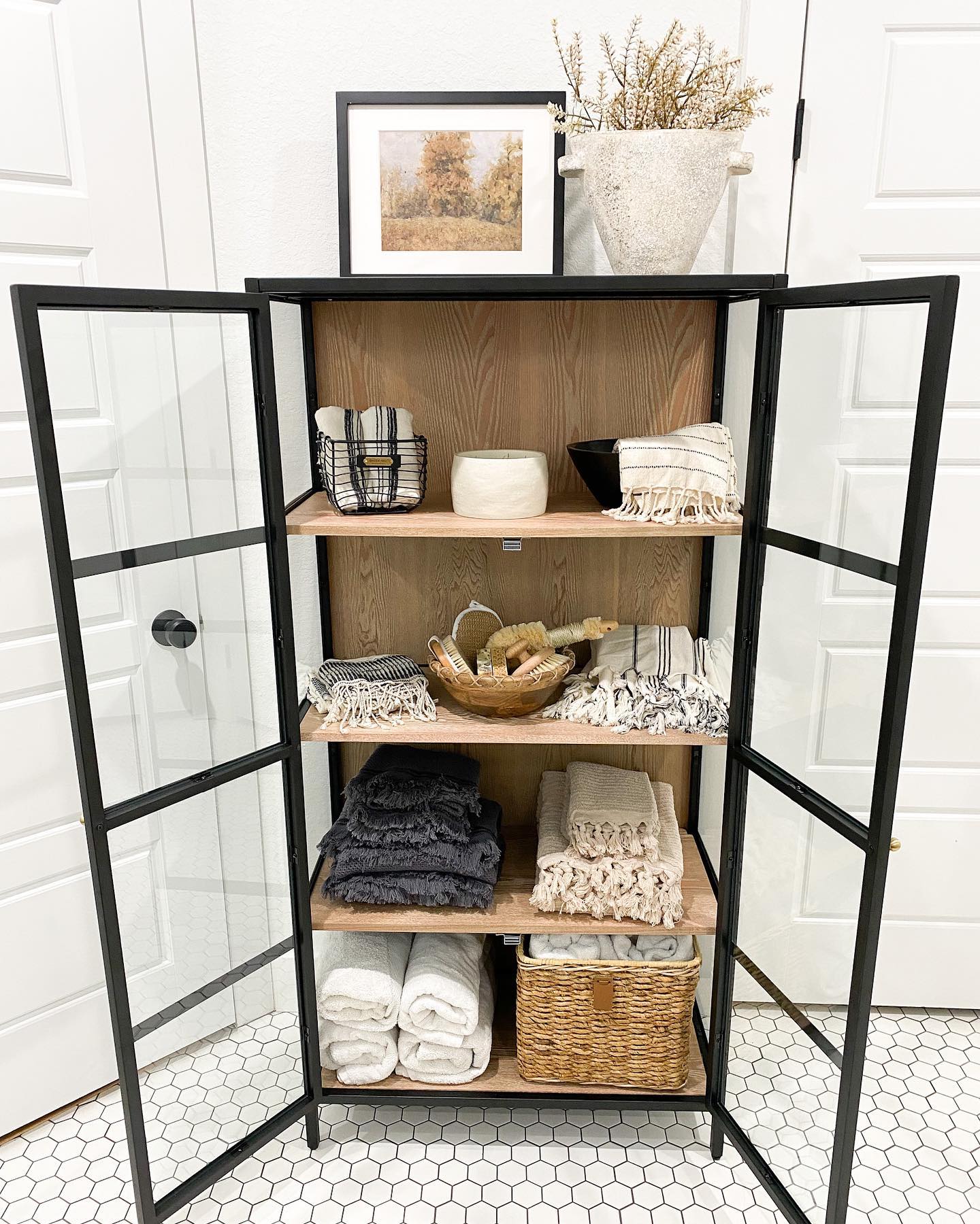 2. Underwater Adventure: a Cabinet with Coral-inspired Hardware and Seagrass Baskets