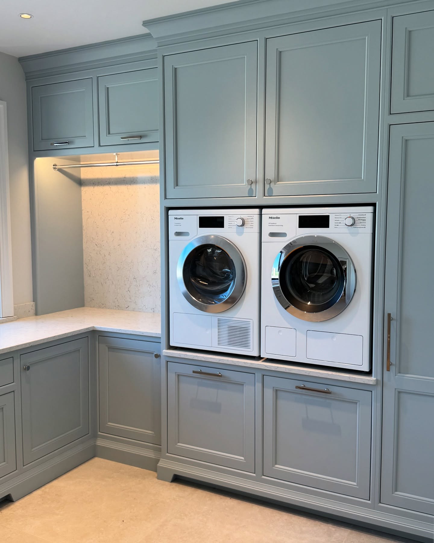 2. the Sunlit Mosaic: a Laundry Room Cabinet with Geometric Glass Inserts