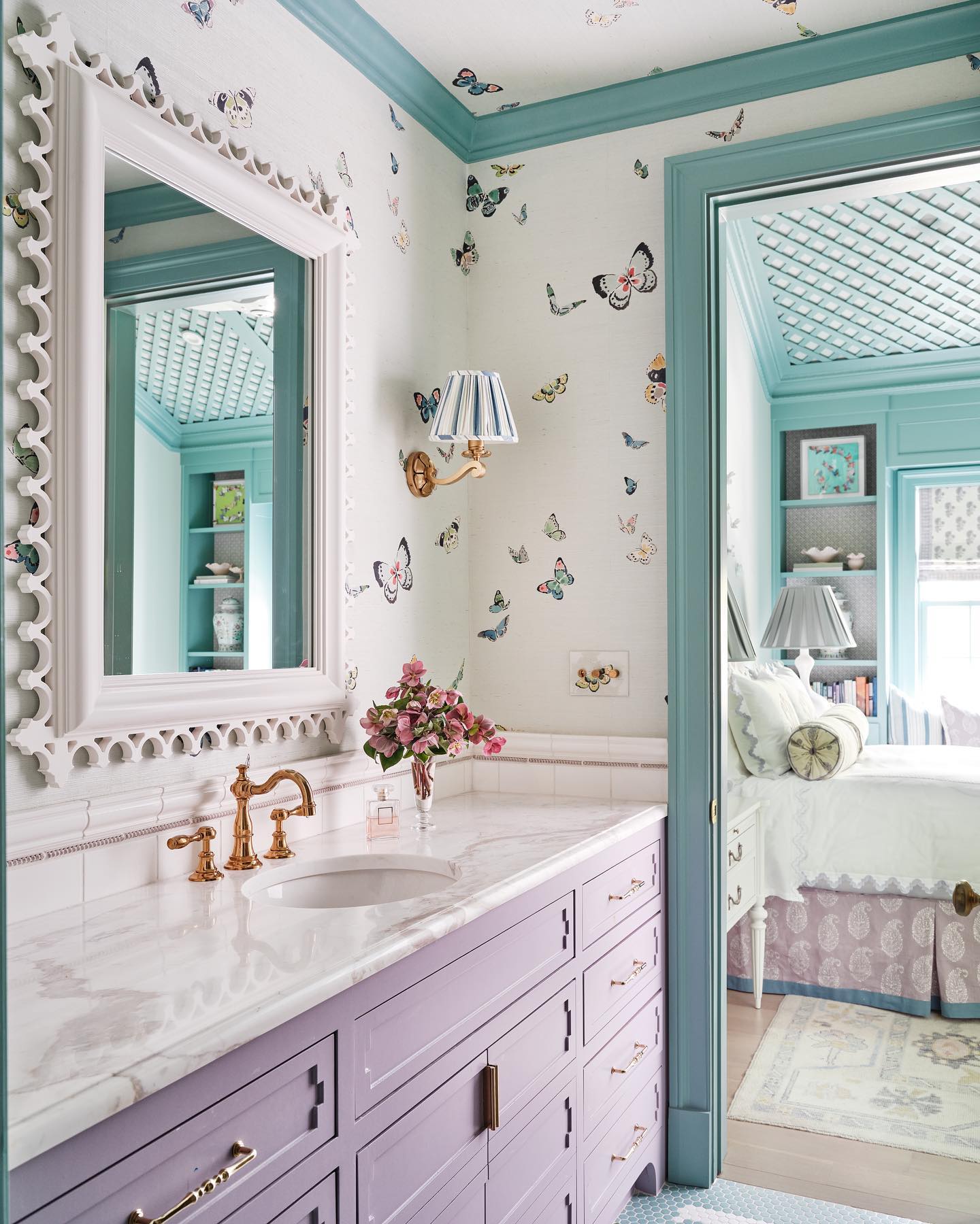 20. Moonlit Mosaic: Reflective Tiles and Starry Lights In a Serene Girls' Bathroom