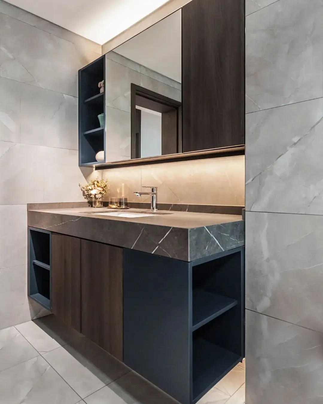 9. Moonlit Marble and Brass: a Bathroom Cabinet with Ethereal Glow