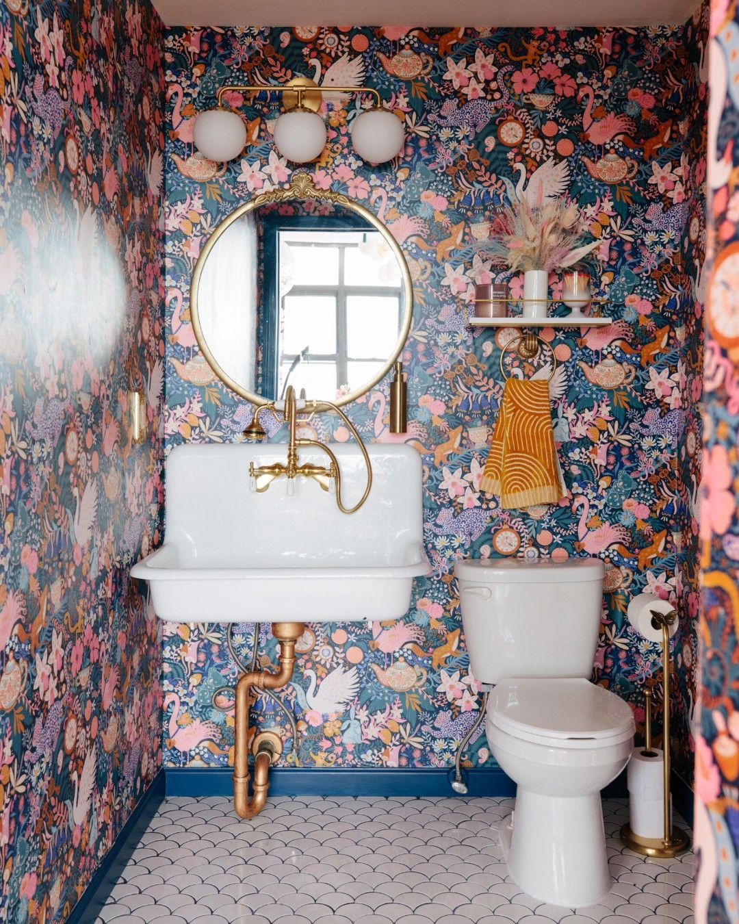 12. Vibrant Mosaic Tiles Meet Retro Fixtures In a Whimsical Bathroom Oasis