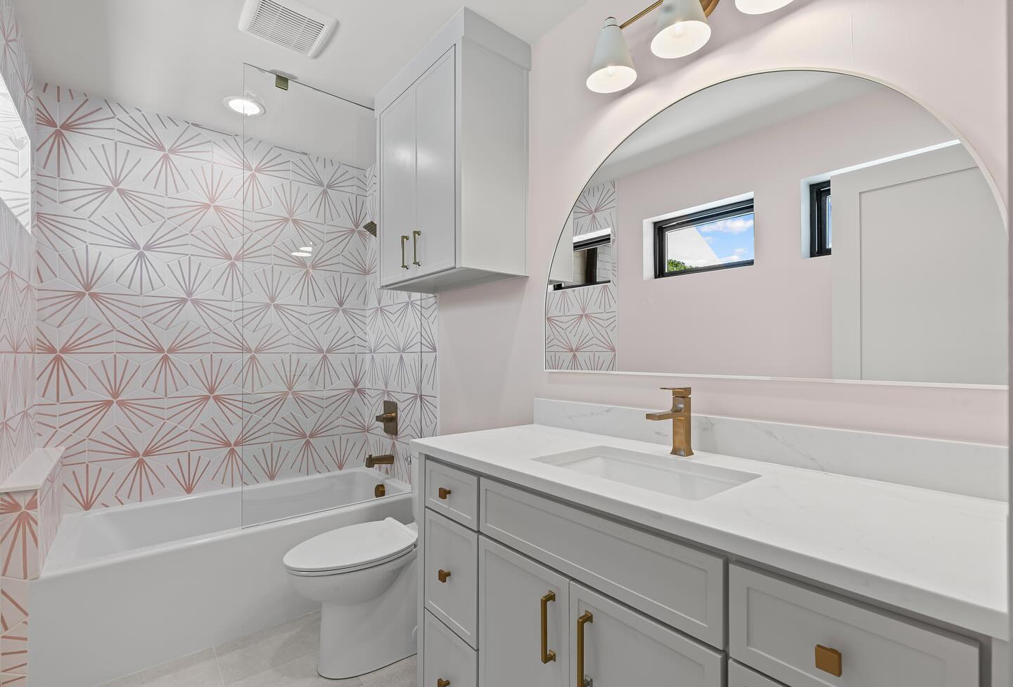 2. Copper Piping Accents and Mint Green Shelves In a Petite Bathroom Retreat
