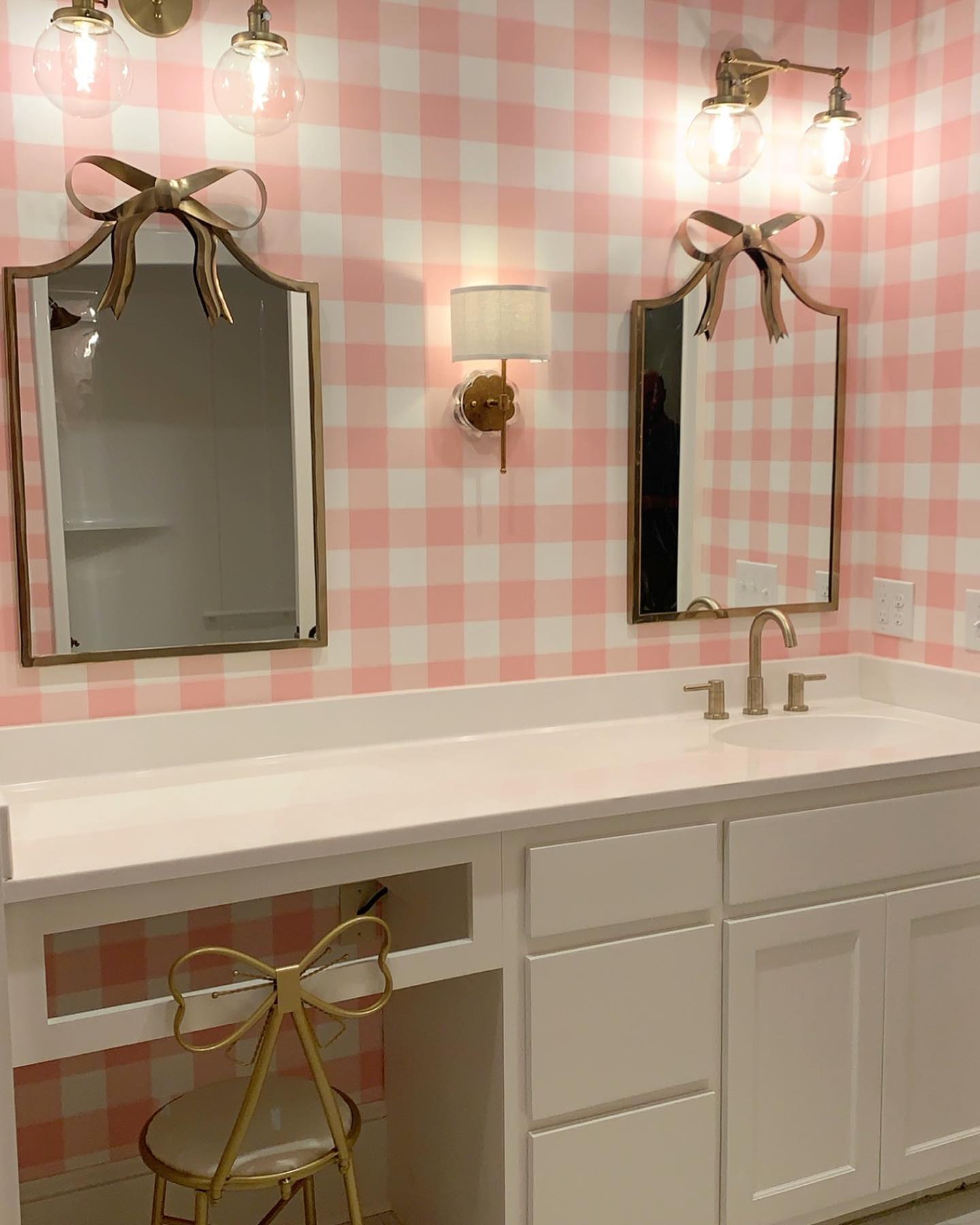 3. Moonlit Vanity with Floating Shelves and Gold Accents